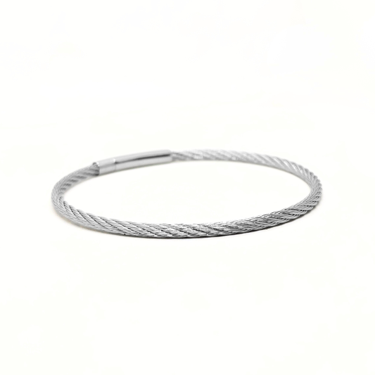 Silver stainless steel bracelet with a twisted design and a magnetic clasp, ideal for men's fashion. Model B-146.