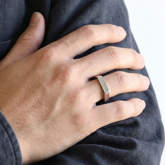 R-9 polished silver steel ring with a flat bar top, US sizes 8 to 12
