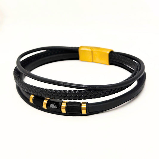 Black Leather B-101 bracelet featuring braided design and gold steel accents from Overpowered Accessories. Stylish and modern