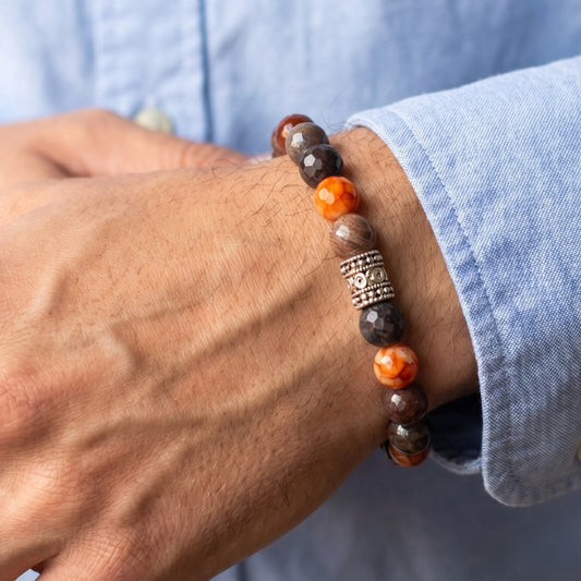 Natural Agate Stone - G-26 Bracelet features a mix of brown and orange beads with a decorative silver centerpiece, worn on a