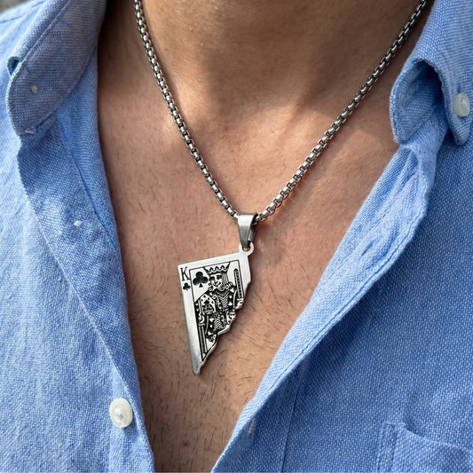Men's PN-009 King Card Pendant necklace by Overpowered Accessories, featuring a silver king card design on a chain.