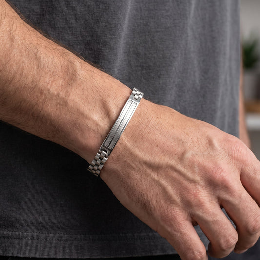 Silver stainless steel bracelet on wrist with interlocking link frame