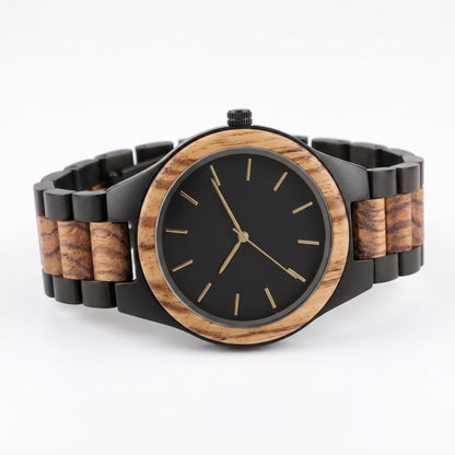 A wooden link watch with a black dial, black case, and natural wood bezel and links, featuring gold-tone hands and indices, set against a plain white background.