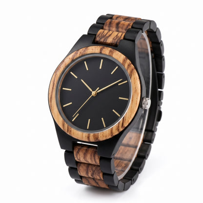 A wooden wristwatch with a black dial and black case, featuring a wood-grain link bracelet and a matching wood-grain bezel, photographed on a clean white background.