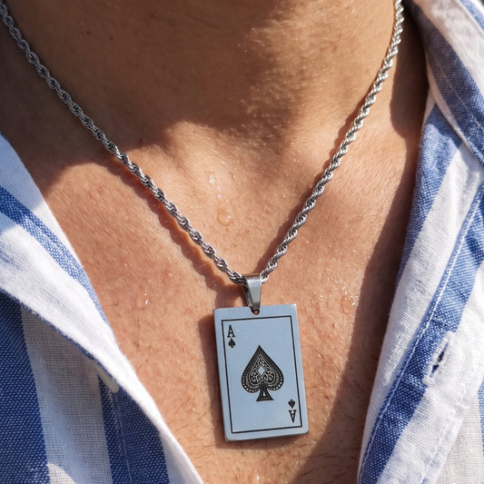 Silver chain necklace with square Ace of spades card pendant, close-up