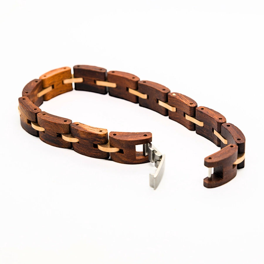 Natural Rosewood B-50 Wooden Bracelet by Overpowered Accessories features a unique design with alternating dark and light woo