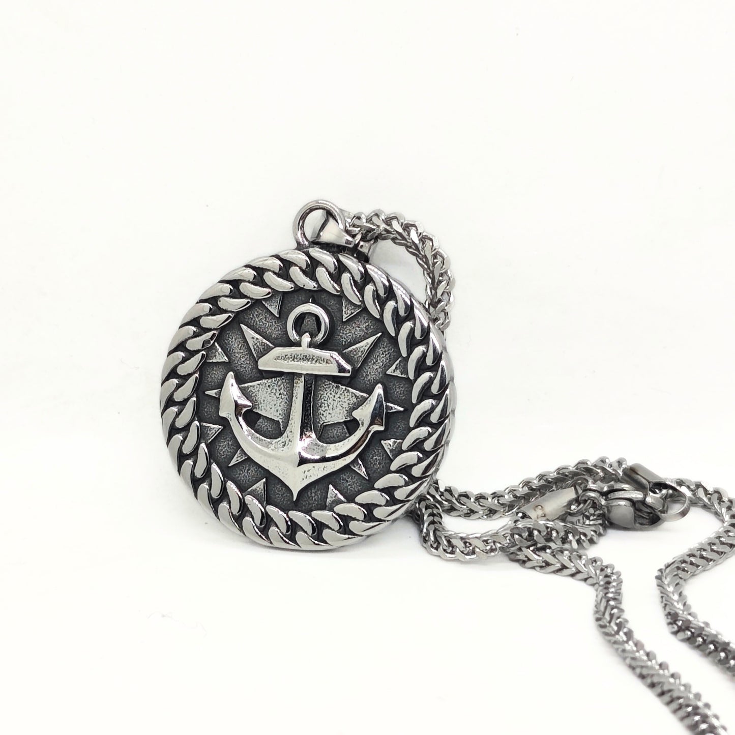 Silver steel anchor pendant necklace with a braided edge design, featuring a prominent anchor symbol.