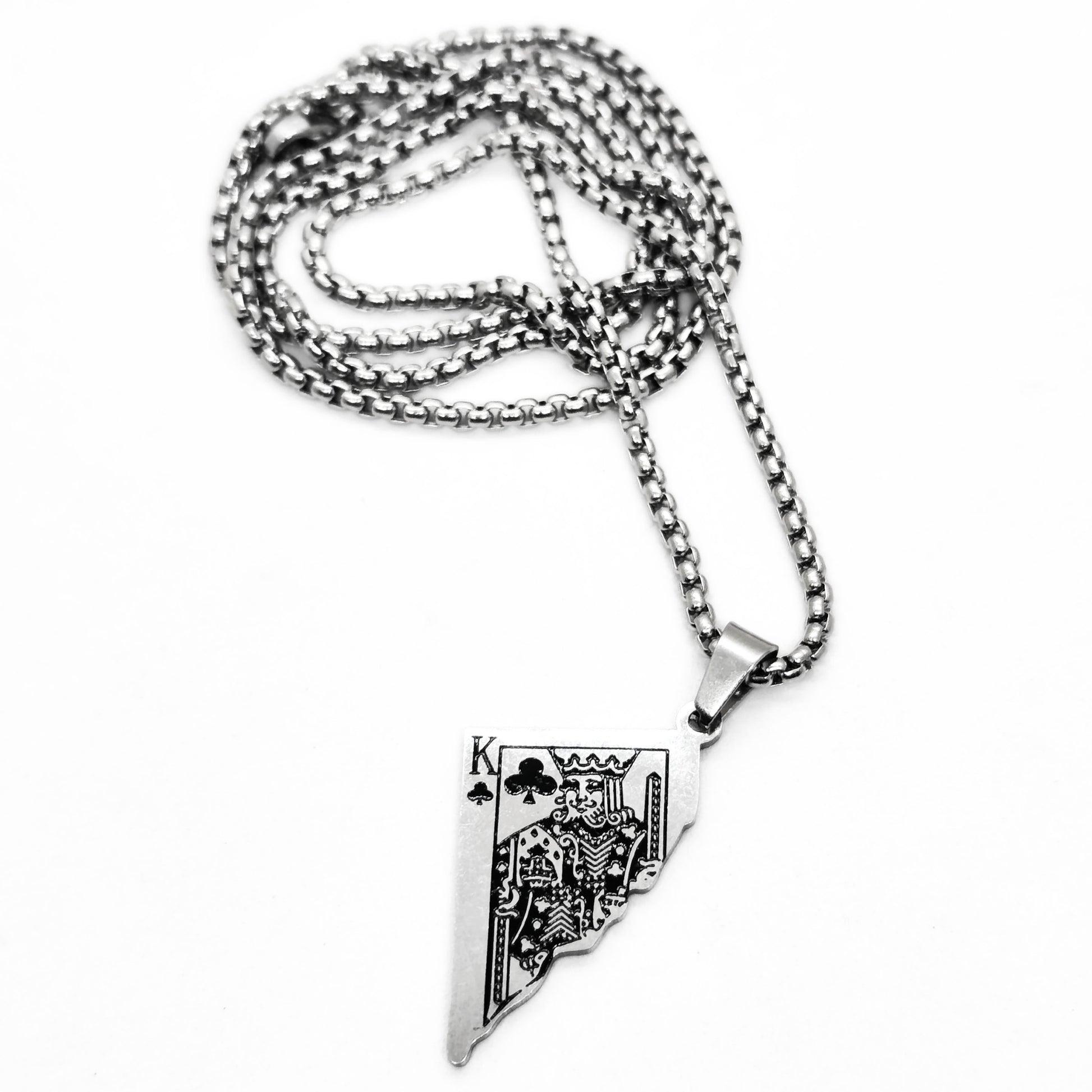 Silver King Card Pendant necklace with intricate design, attached to a chain, from Overpowered Accessories.