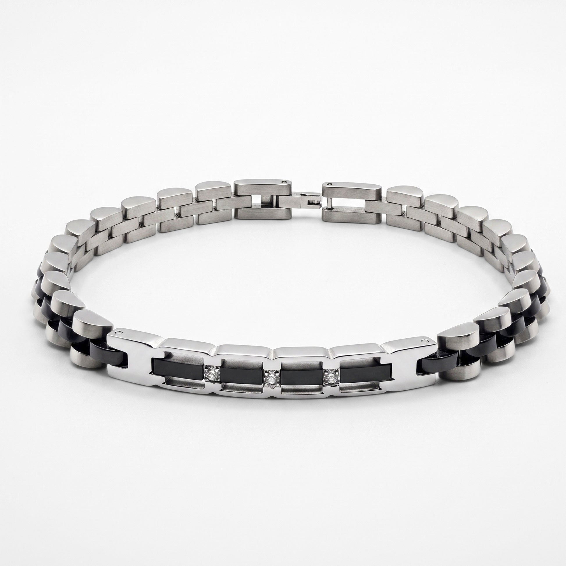 Silver and black stainless steel bracelet with hinged clasp and zircon-style stones