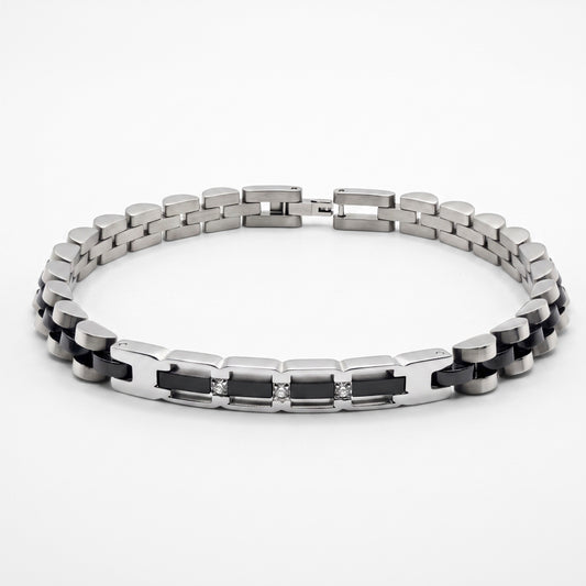 Silver and black stainless steel bracelet with hinged clasp and zircon-style stones