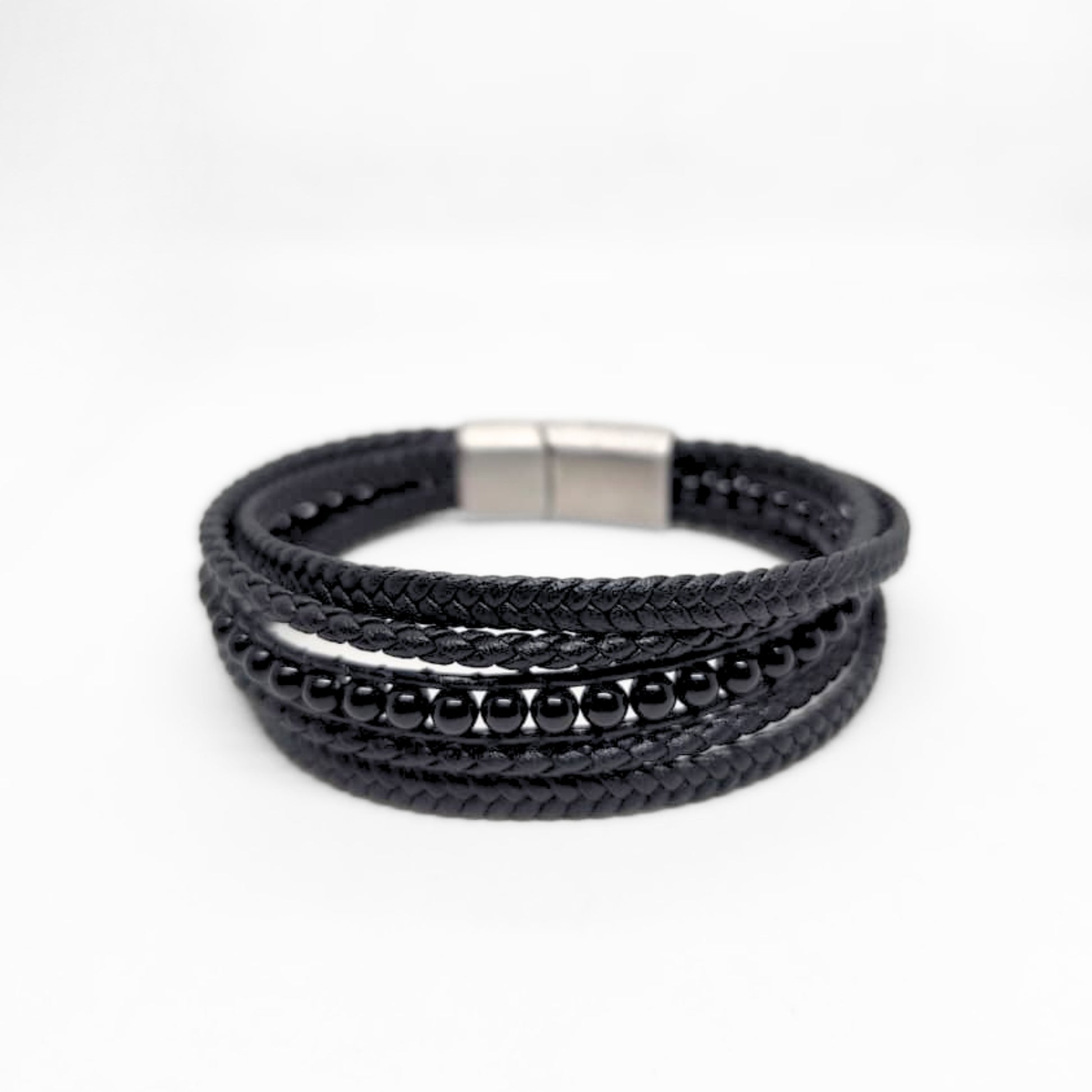 Premium Black Leather Sleek Men's Bracelet by Overpowered Accessories featuring braided leather and bead accents.