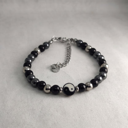 Black & silver bead yin-yang bracelet with round charm and silver chain extender