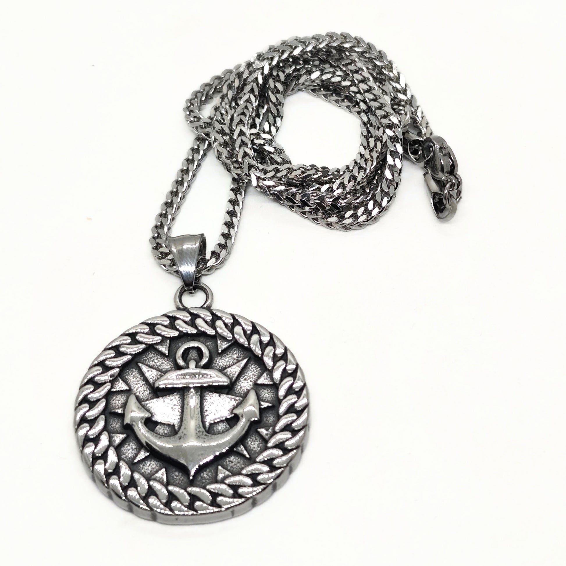 Silver steel anchor pendant necklace with a braided border and a chain, designed by Overpowered Accessories.