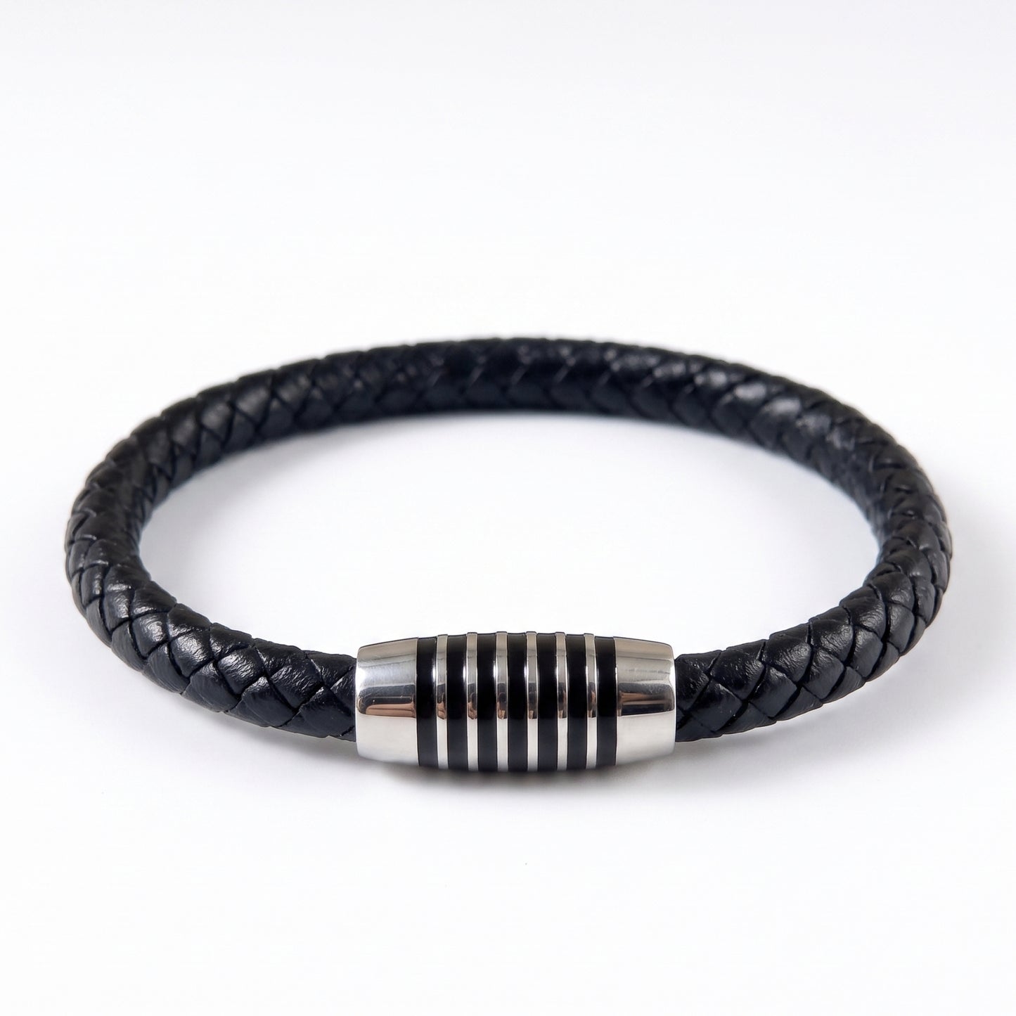 Black braided leather bracelet shown flat with silver-tone ringed clasp