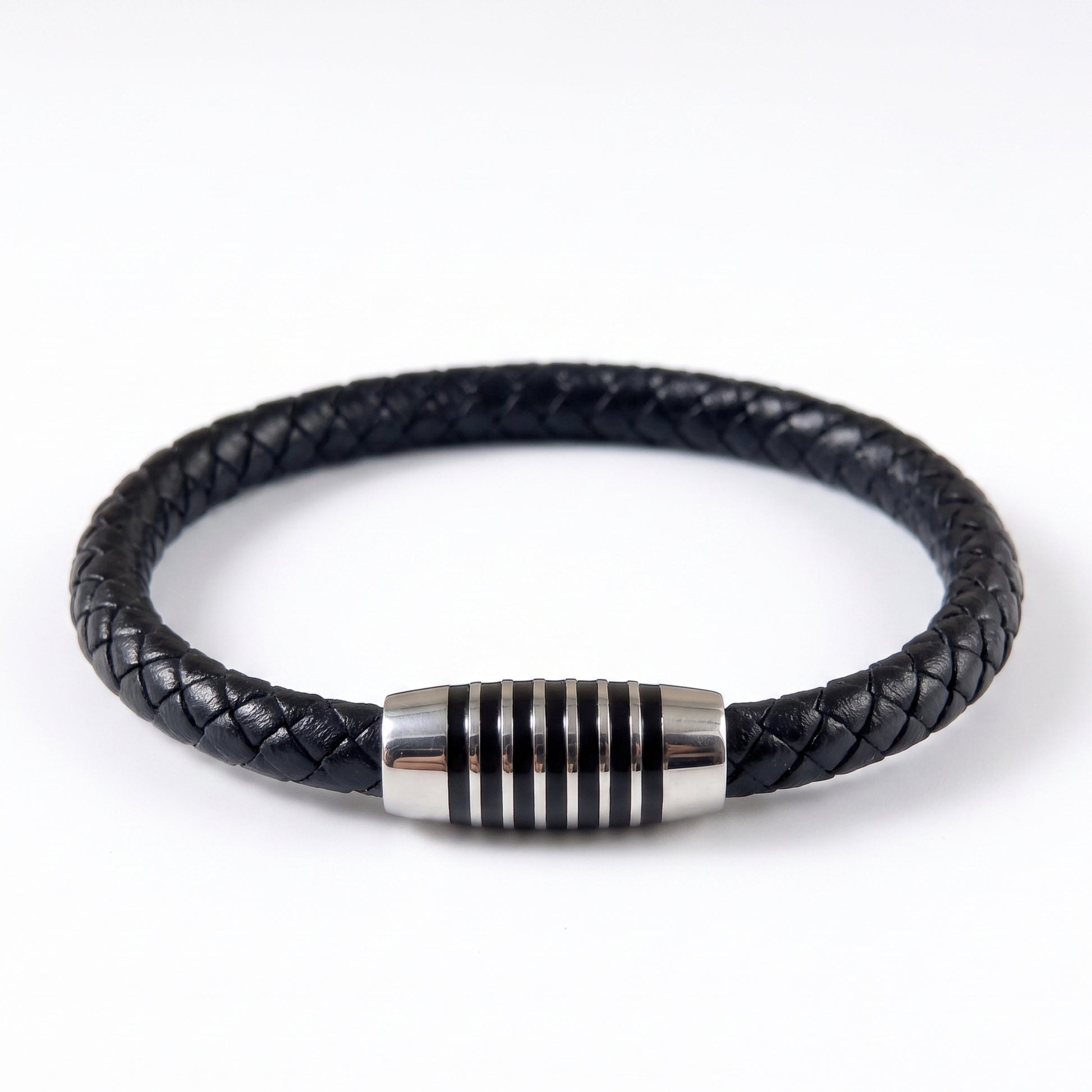 Black braided leather bracelet shown flat with silver-tone ringed clasp