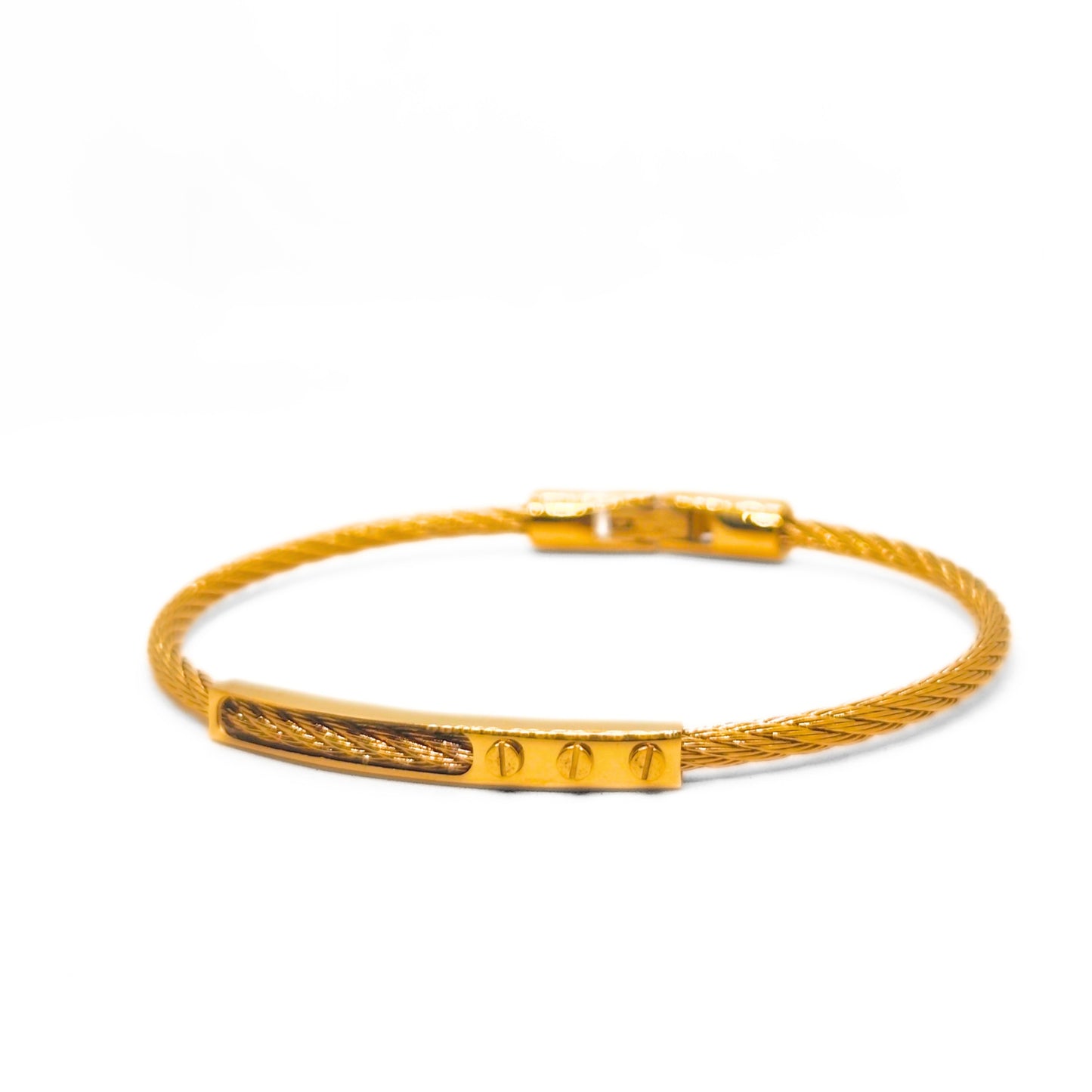 Gold bracelet with a textured band on a white background