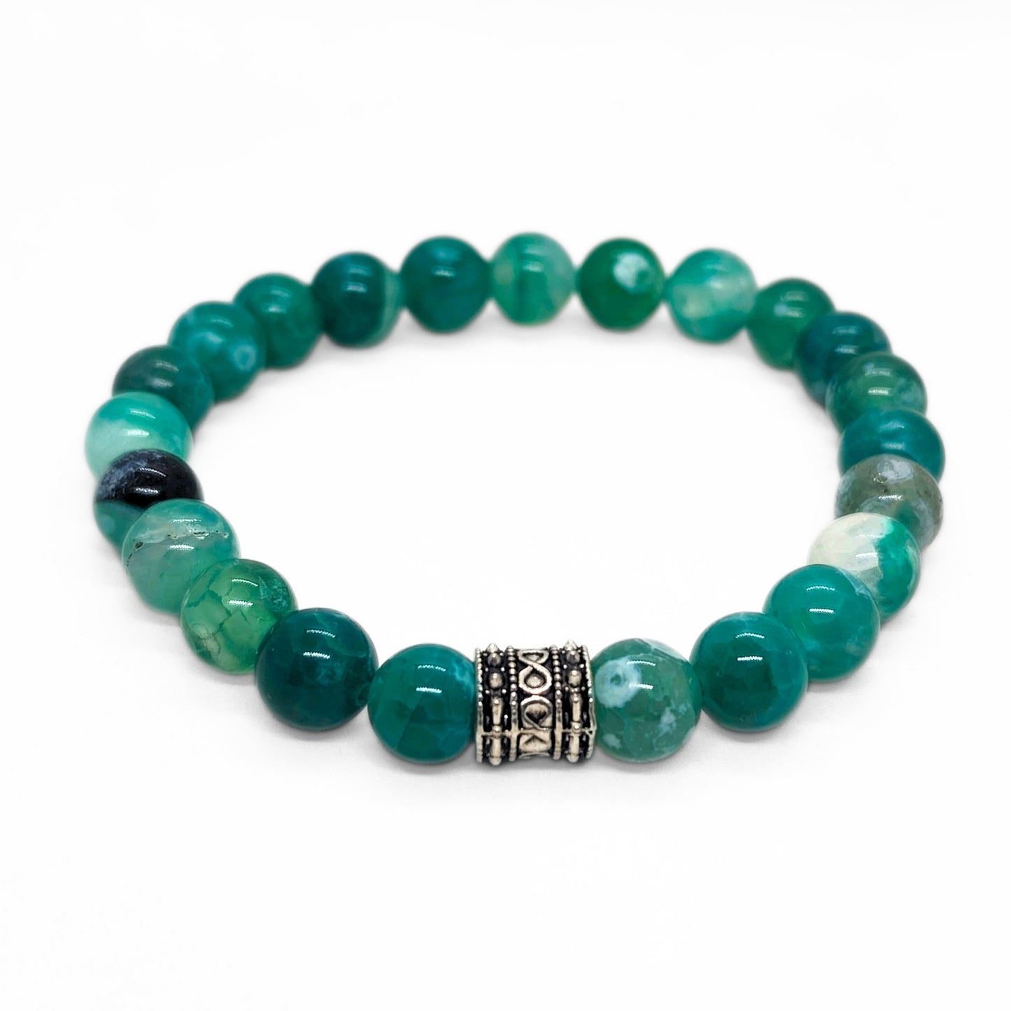 Green agate bead bracelet with ornate silver-tone barrel spacer and dark end beads