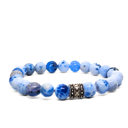 Men’s agate bead bracelet in light blue and dark blue with an ornate black spacer.
