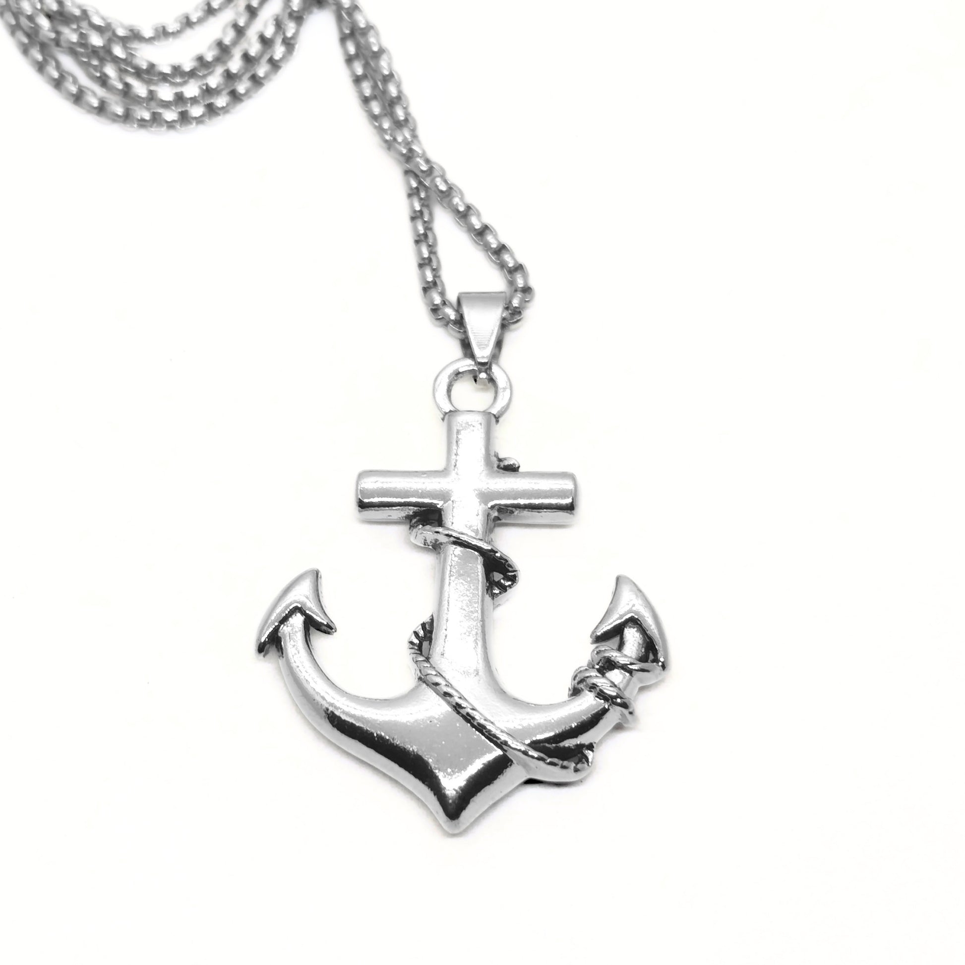 Silver anchor and cross pendant on a chain necklace