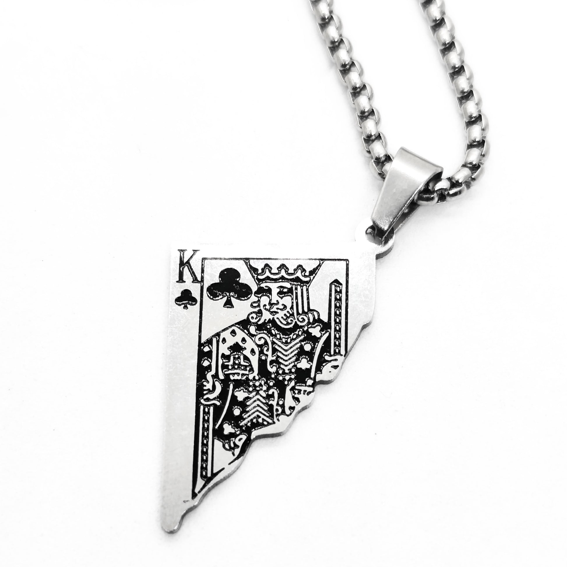 Silver King Card Pendant necklace with spade design, attached to a metal chain, by Overpowered Accessories.