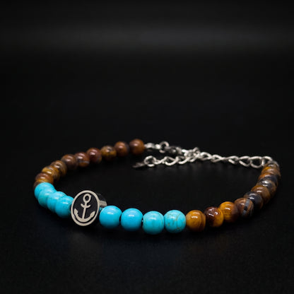 Men's tiger eye and turquoise bead bracelet featuring a round anchor medallion charm