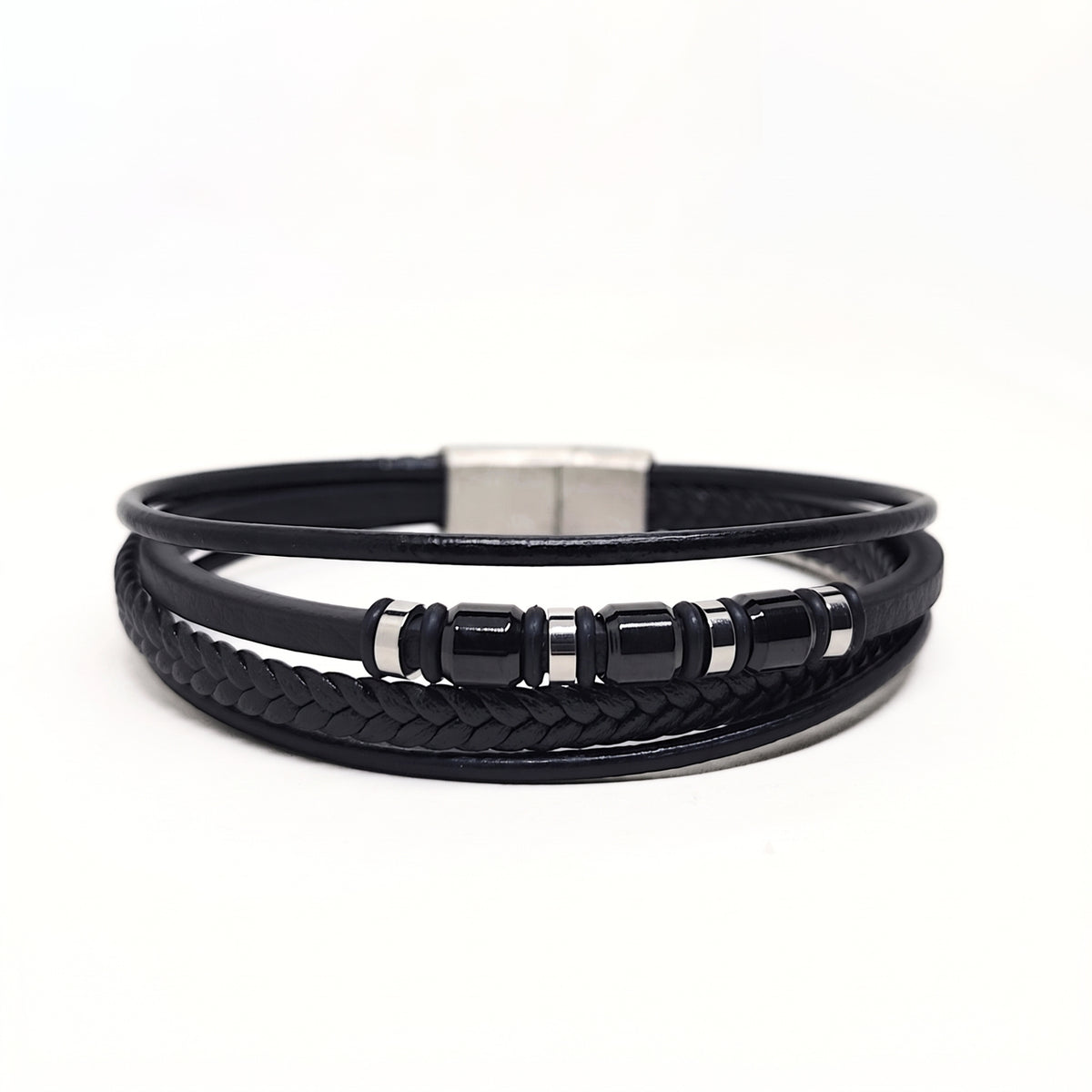 A black multi-strand leather bracelet featuring a braided section, smooth loops, glossy black beads, and a silver-toned rectangular clasp, shown on a plain white background.