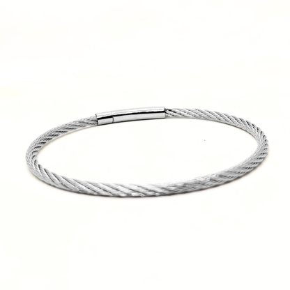 Silver stainless steel bracelet with a magnetic clasp, featuring a sleek twisted cable design. Ideal for men.
