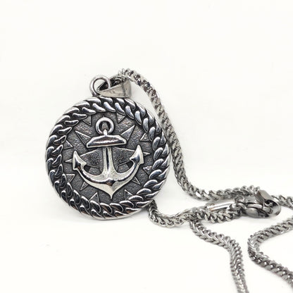 Silver steel anchor pendant necklace with a braided border, featuring a detailed anchor design, by Overpowered Accessories.