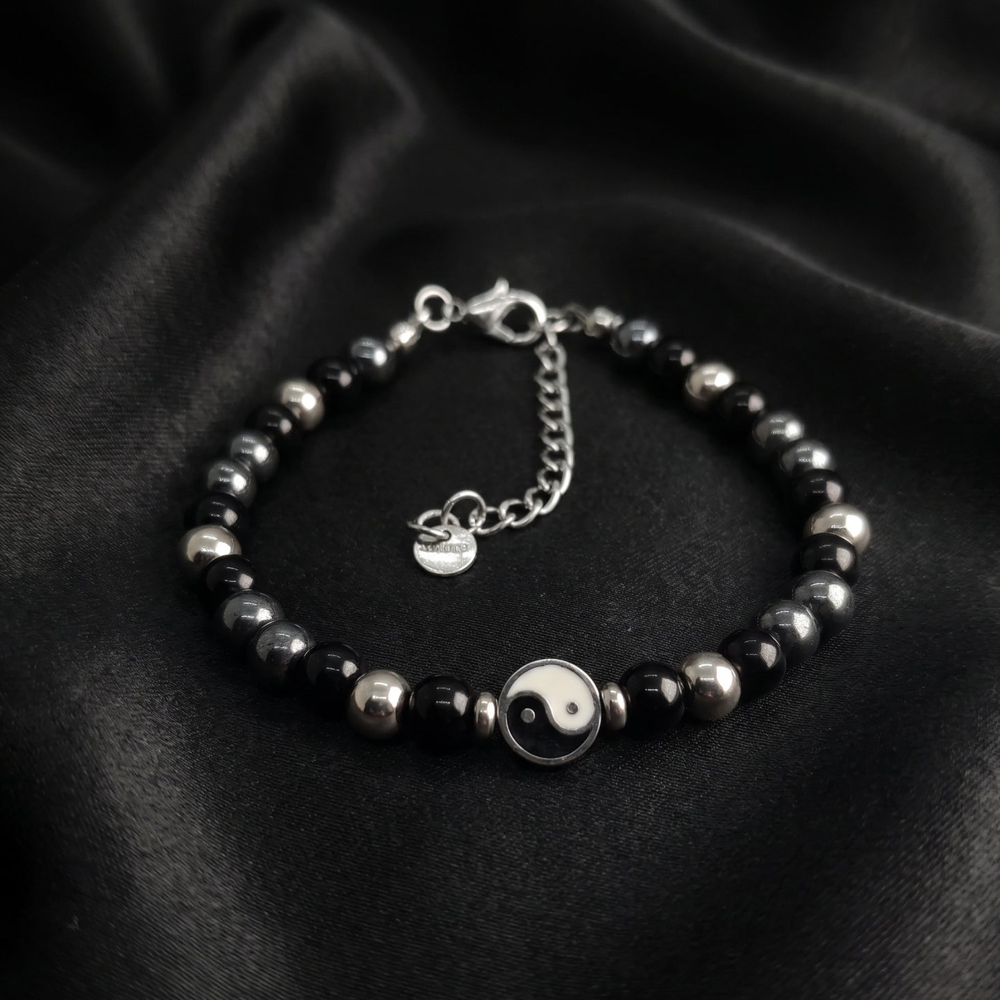 Black & silver bead yin-yang bracelet with round yin-yang charm and silver chain
