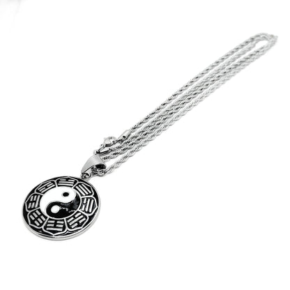 Yin-yang pendant necklace with round black-and-white enamel pendant on silver chain