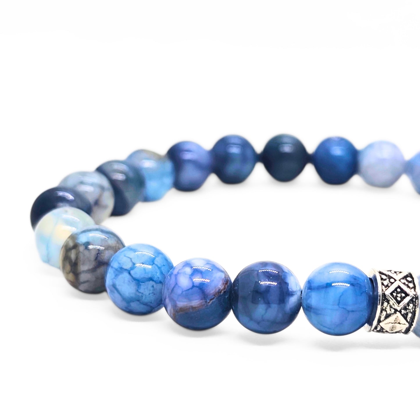 Blue agate stretch bracelet with mixed blue beads and diamond-pattern clasp