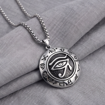Oval eye pendant necklace on silver chain, detailed emblem