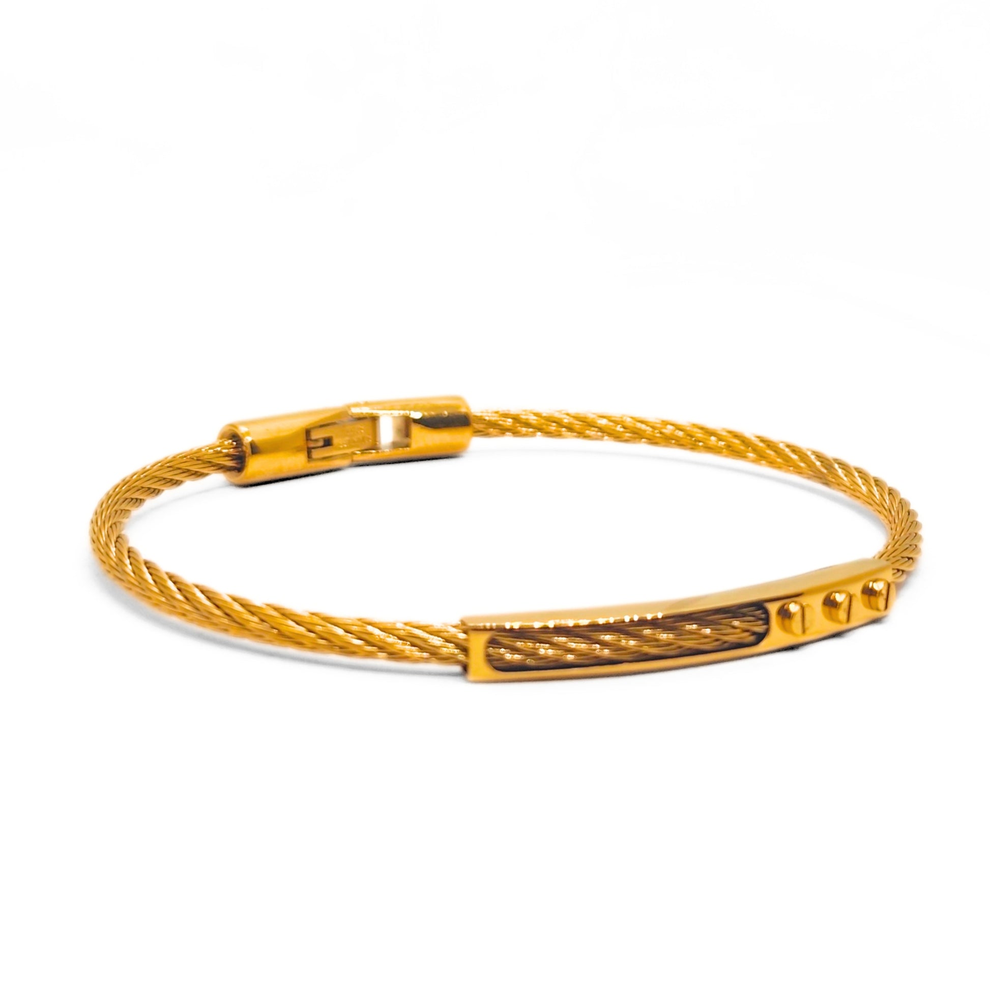 Gold bracelet on a white background