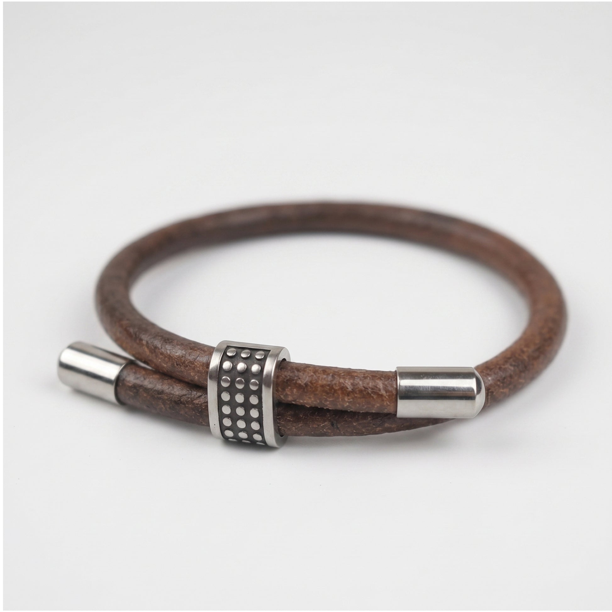 Men's brown leather bracelet, studded center with silver barrel end caps