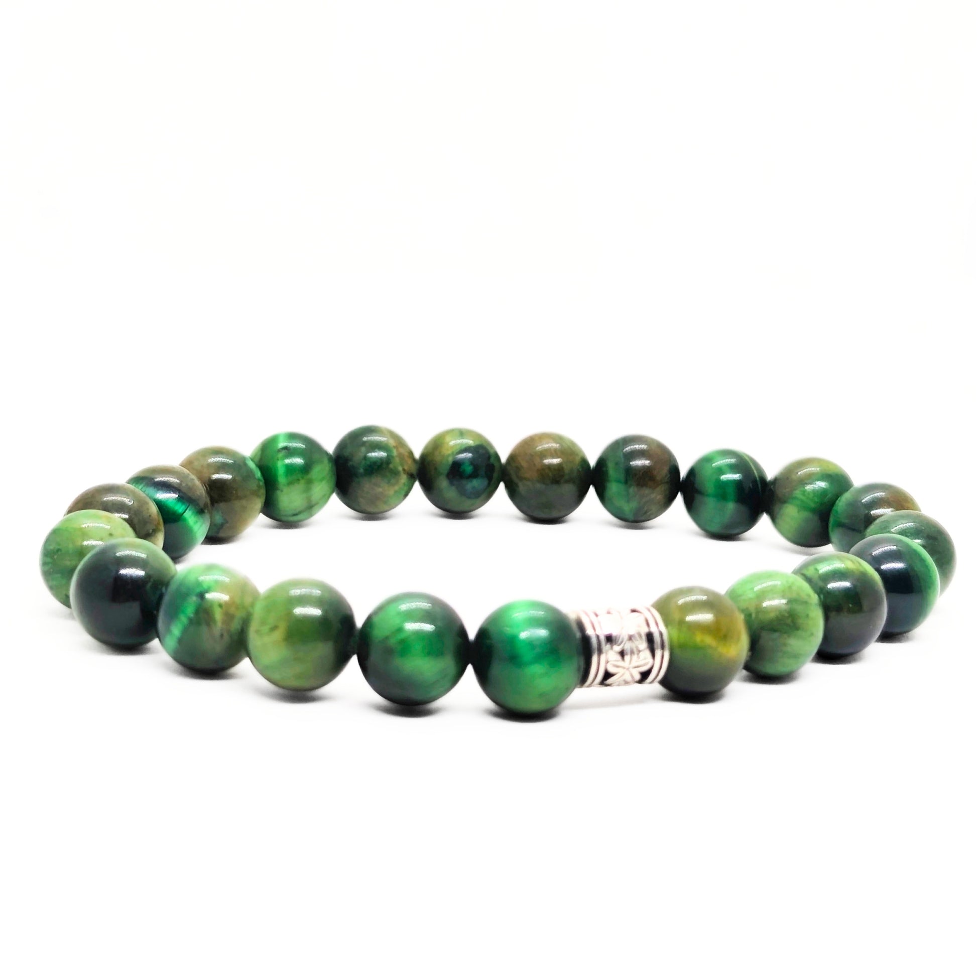 Green tiger's eye beaded bracelet with engraved silver-toned clasp centerpiece.