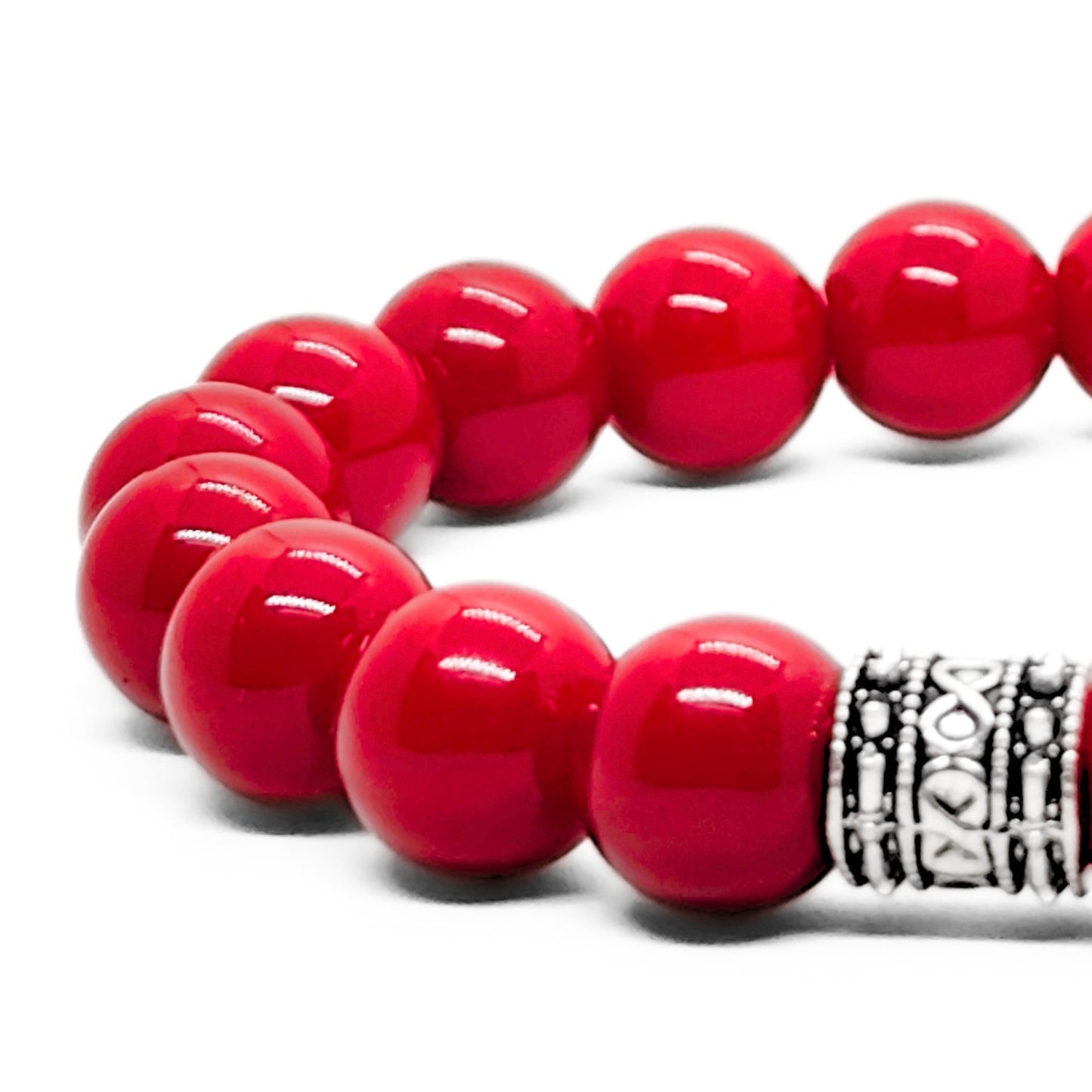 Red agate bead bracelet with silver-tone patterned bead accent