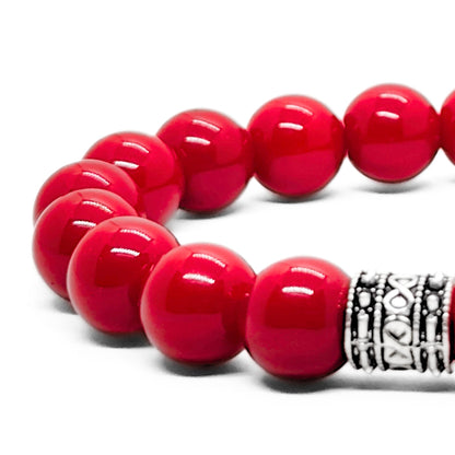 Red agate bead bracelet with silver-tone patterned bead accent