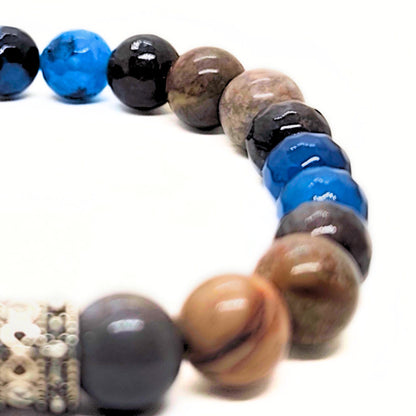 Natural Agate Stone G-23 Bracelet by Overpowered Accessories featuring a mix of blue, black, and brown beads with a decorativ