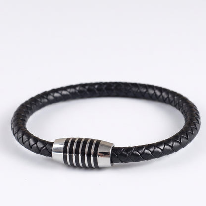 Black braided leather bracelet with silver-tone ringed clasp, side angle