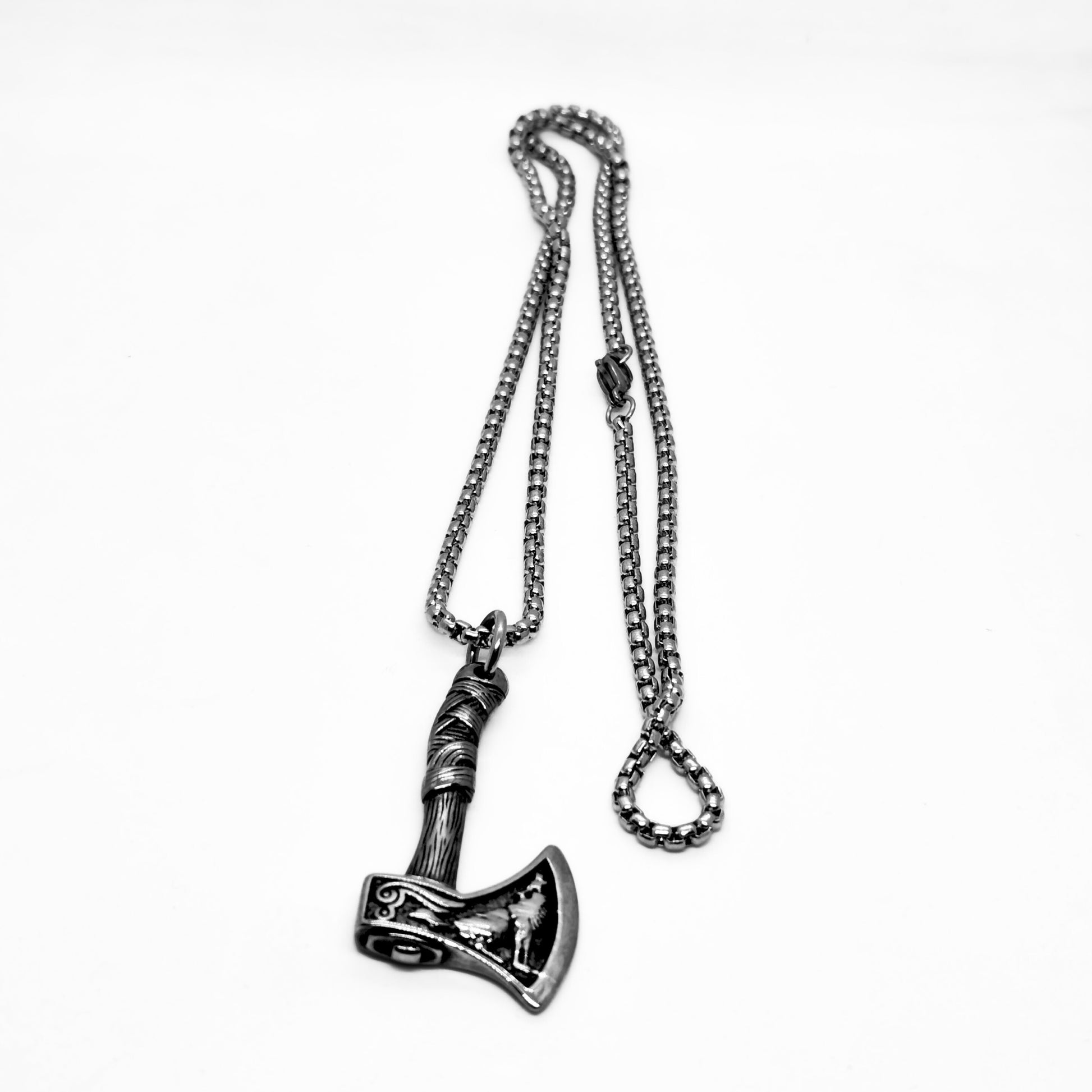Men's Oceanic Blade Bundle B-39 pendant featuring a detailed axe design on a silver chain necklace.