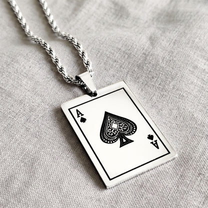 Ace of Spades card pendant with twisted silver chain, close-up angle