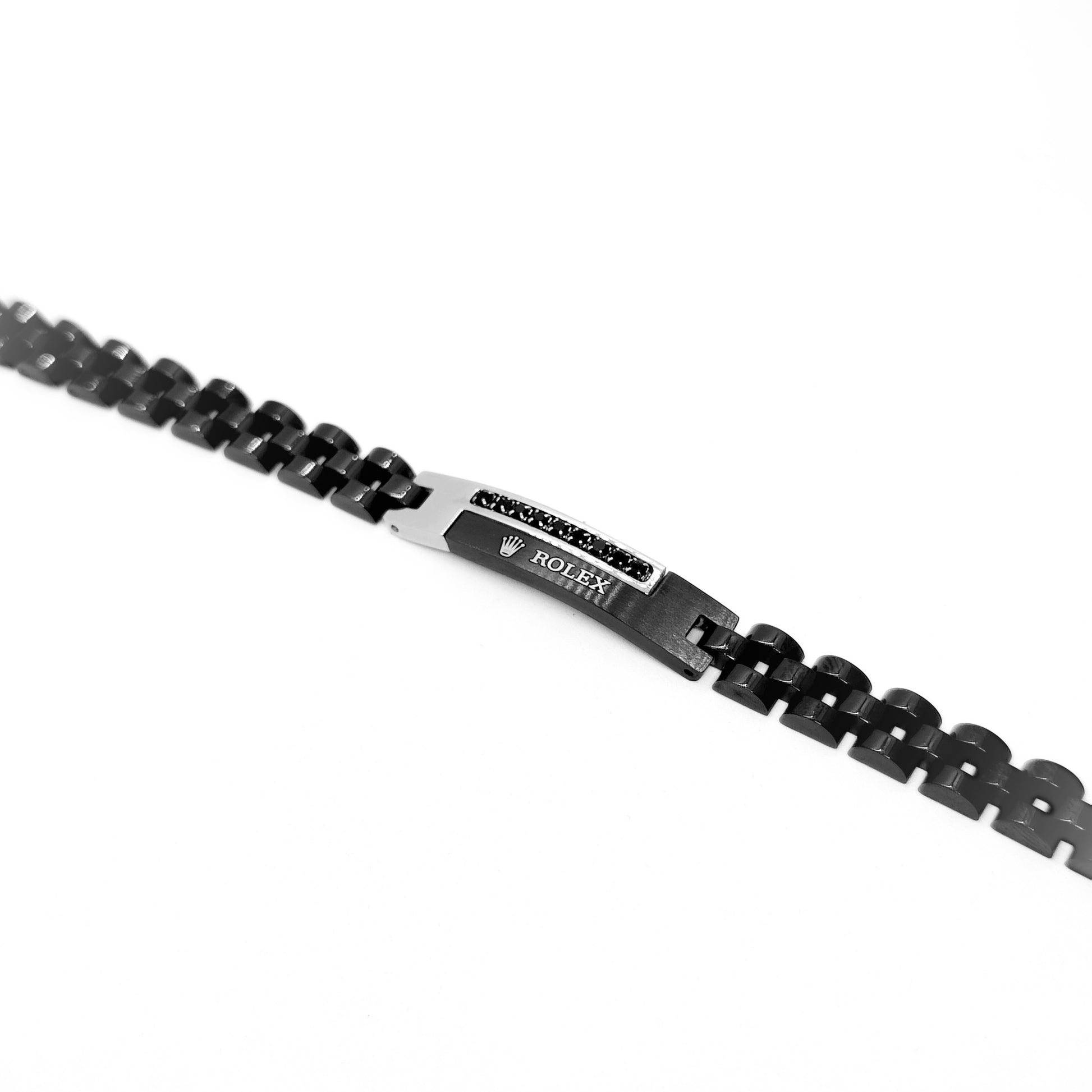 Silver and black stainless steel B-150 bracelet for men by Overpowered Accessories, featuring a sleek design and clasp.