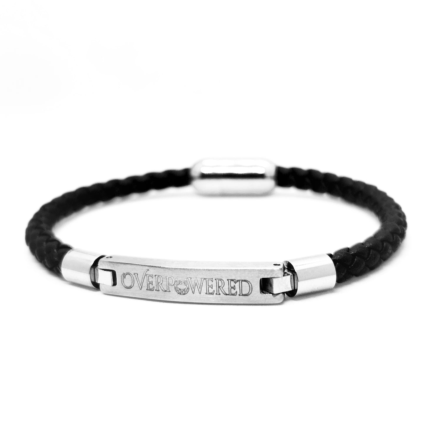 A black braided cord bracelet with a polished silver-tone metal ID bar engraved with the word 'OVERPOWERED'.