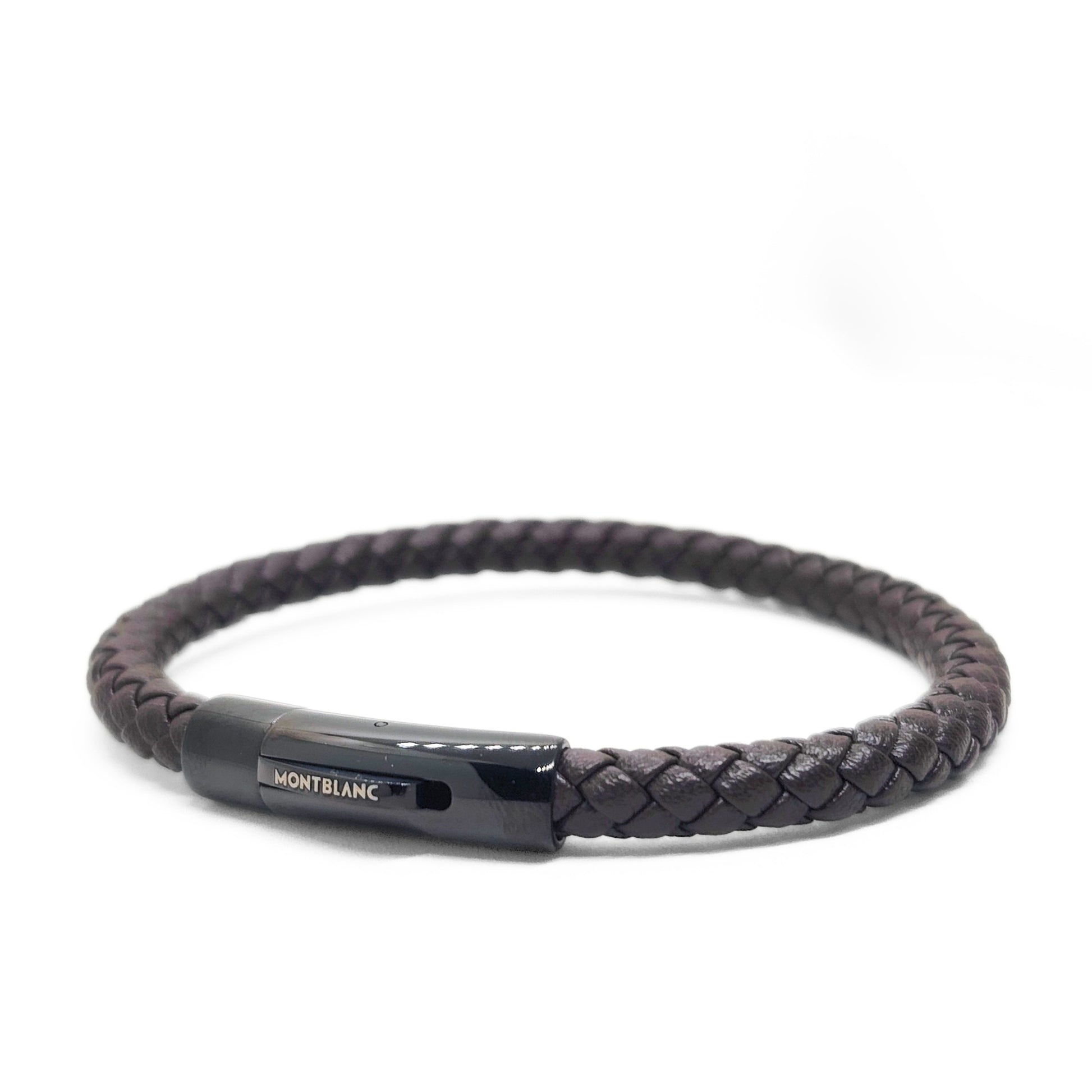 Men’s braided leather bracelet with dark clasp and engraved logo plate