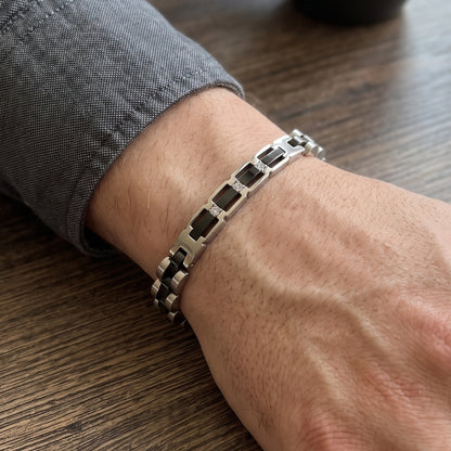 Stainless steel bracelet with silver and black rectangular links and square accent stones