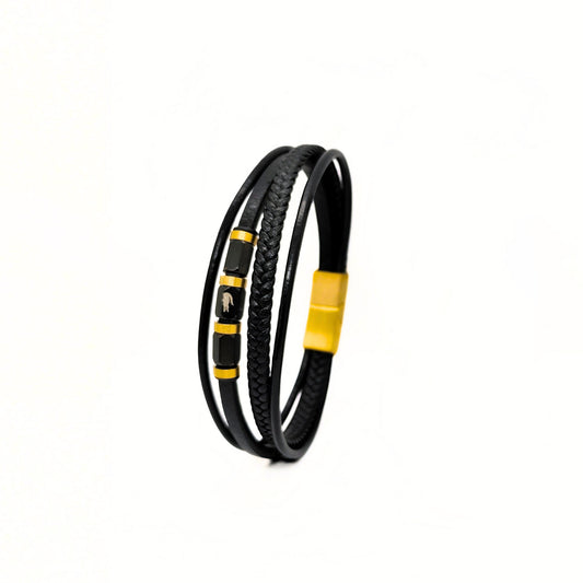 Black Leather B-101 bracelet featuring braided design with gold steel accents, showcasing a stylish and modern look.