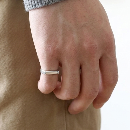 R-9 men's silver steel signet ring, side view of the smooth band