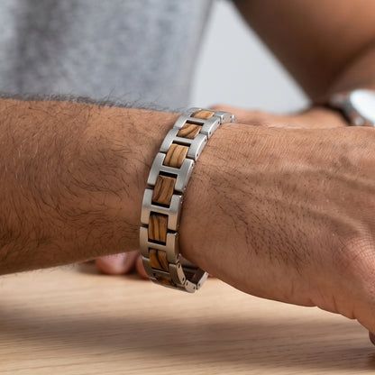 Zebrawood and stainless steel bracelet worn on wrist, close-up of link design, Overpowered Accessories