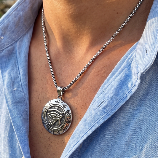 Silver-tone eye symbol pendant on chain necklace