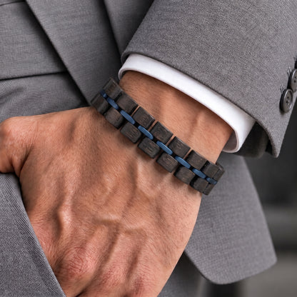 Men's adjustable ebony wood bead bracelet with blue inlay, worn on wrist, Overpowered Accessories